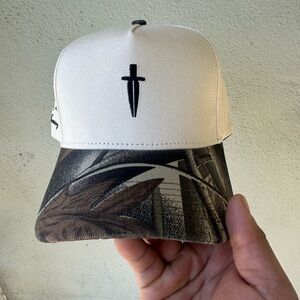 Ironwilled Dagger snap back hat in cream/forest camo